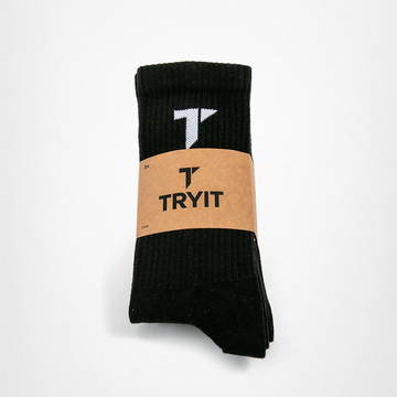 Schwarze Socken mit weißem "T" Logo und brauner Banderole mit schwarzem "TRYIT" Logo.