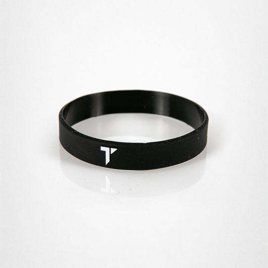 Schwarzes Silikonarmband mit weißem „T“-Logo von TRYIT.