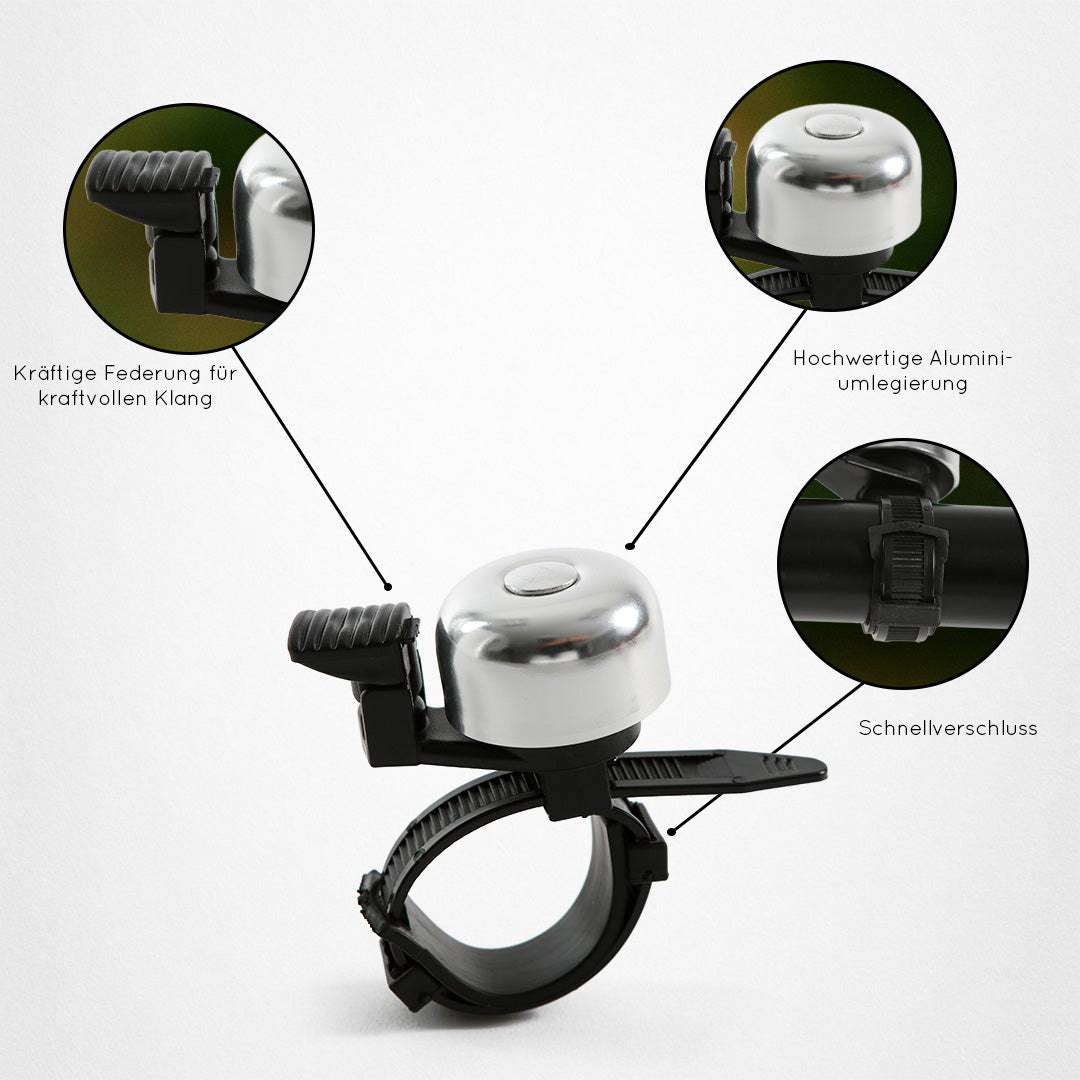 Silberne Fahrradklingel mit schwarzen Befestigungen, detaillierte Ansichten von Federung, Aluminiumlegierung und Schnellverschluss.